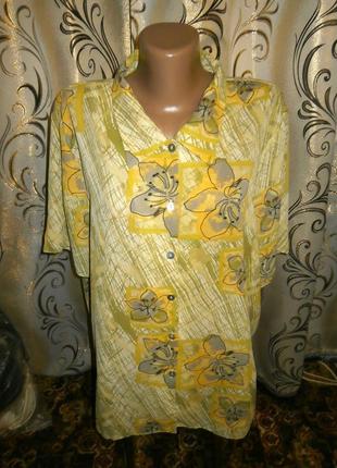 Яскрава блуза з квітковим принтом young elegance collection