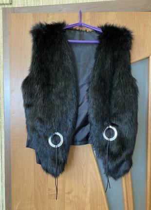 Меховая жилетка это кожа черная новая