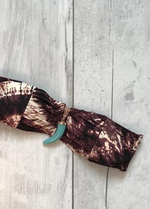 Бюстик від купальника