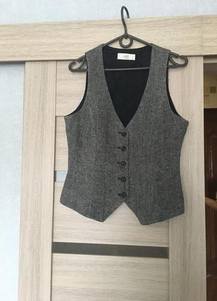 Жилетка
