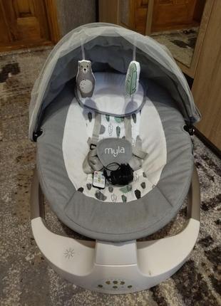 Дитяча гойдалка-шезлонг, заколисуючий центр