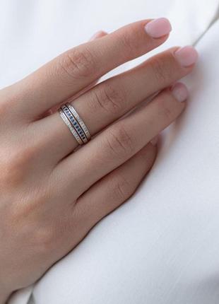 Золотое кольцо с синими сапфирами и бриллиантами 
к4092 фото