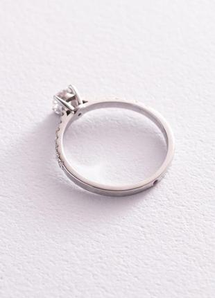 Помолвочное золотое кольцо с бриллиантами 
и сапфиром 101-10094(4.2)2 фото