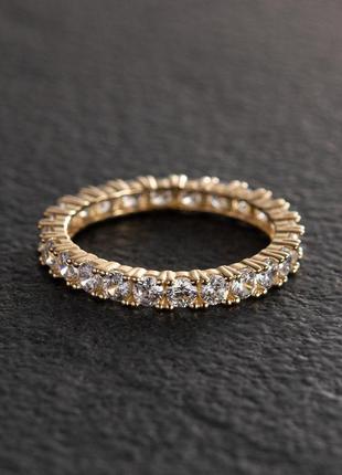 Кольцо с дорожкой камней в желтом золоте 
к072015 фото
