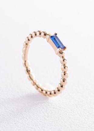 Золотое кольцо "аннабель" с синим фианитом 
к07182
