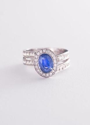 Золотое кольцо с синим сапфиром и бриллиантами 
км0152