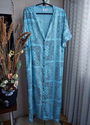 Блакитна довга сукня, вільного крою с кишенями coco bella(розмір 42-44)