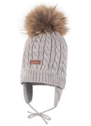Теплая зимняя вязаная шапка помпон натуральный мех с флисовой подкладкой с бубенцом lenne janne