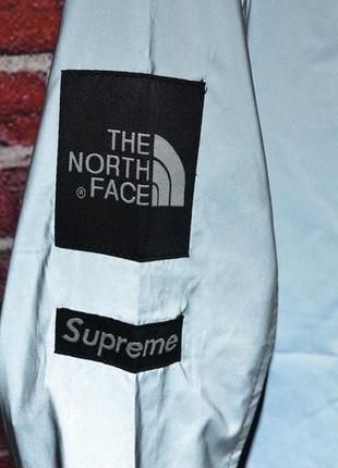 Куртка supreme x tnf the north face рефлективная ветровка серая с черным мужская / женская7 фото