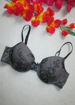 Брендовый красивый  бюстгальтер в цветочный орнамент hema
