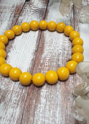 Сонячне намисто з дерева