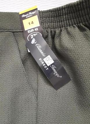 Крутые фактурные брюки со стрелками зауженные к низу сзади на резинке classic image5 фото