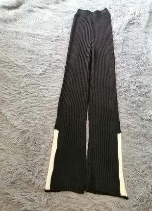 Длинное вязаное брюки палаццо с разрезами по бокам в рубчики по бокам в рубчик с высокой посадкой рез2 фото