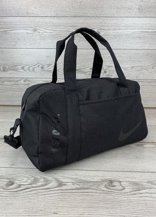 Спортивна сумка nike чорна текстиль6 фото