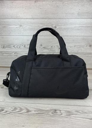 Спортивна сумка nike чорна текстиль5 фото