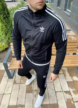 Чоловічий спортивний костюм adidas чорний адідас без капюшона лакосту1 фото