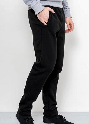Актуальні теплі чоловічі спортивні штани на манжетах прямі чоловічі спортивні штани на флісі утеплені чоловічі спортивні штани з начосом3 фото