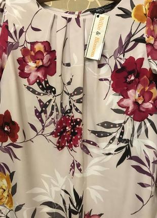 Нереальной красоты брендовая блузка в цветах.7 фото