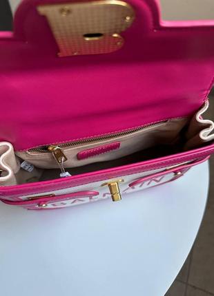 Женская розовая сумка7 фото