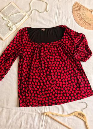 Нарядна трикотажна блуза з рослинним принтом (розмір 44-46)