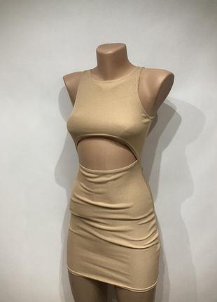 Бежева сукня в рубчик з вирізом