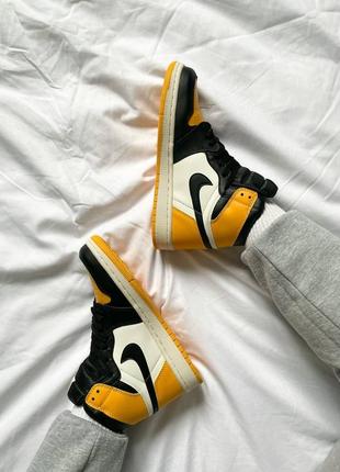 Кросівки чоловічі / жіночі жовті з шкіри nike air jordan 1 yellow black2 фото