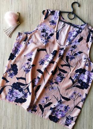 Ніжна персикова блуза у квітковий принт