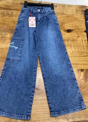 Стильні джинси для дівчинки в стилі карго