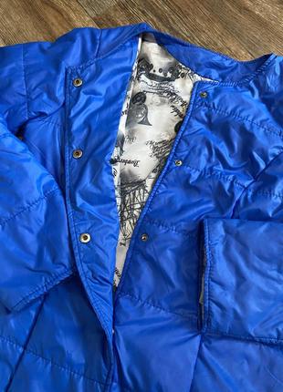 Женская демисезонная курточка  на кнопках голубого цвета3 фото
