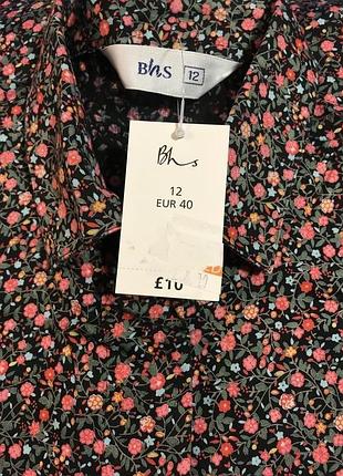 Очень красивая и стильная брендовая рубашка в цветочках..100% коттон.