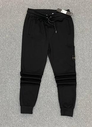 Штани stone island