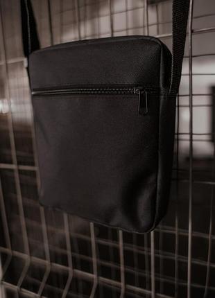 Барсетка tnf чорний 3