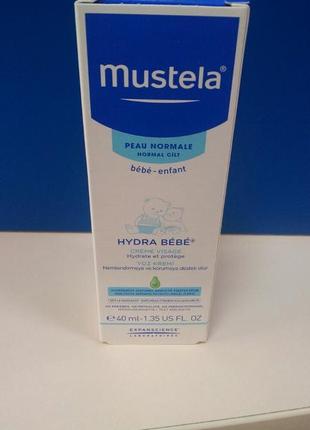 Mustela дитячий зволожуючий крем для обличчя.