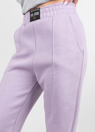 Жіночі зимові теплі спортивні штани штани на флісі кльош3 фото