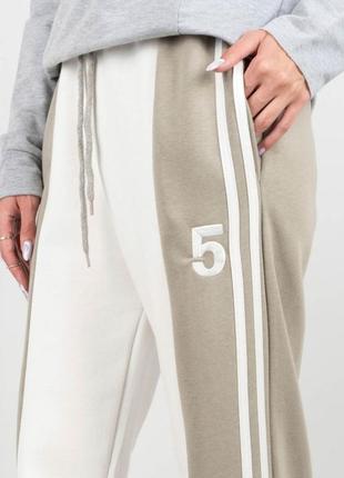 Женские зимние теплые спортивные брюки штаны на флисе3 фото