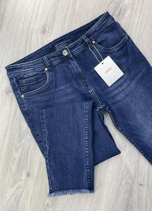 Джинсы с крутым низом