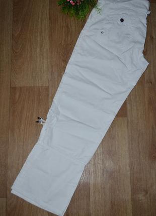 Білі , стильні штани - бриджі трансформери від next з кишенями.2 фото