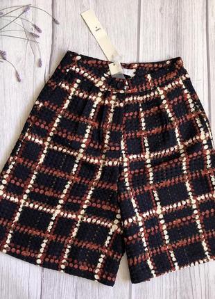 Шорти кльош