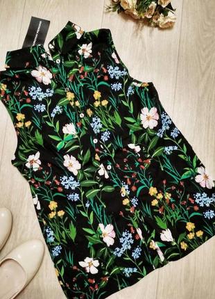 Оригинальная блузка без рукавов в цветочный принт1 фото