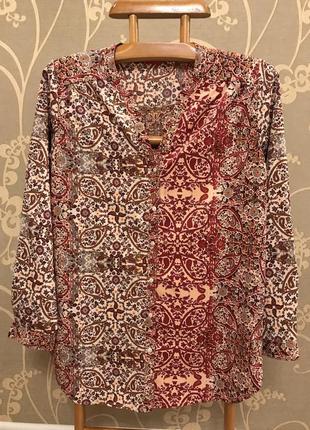 Очень красивая и стильная брендовая блузка.