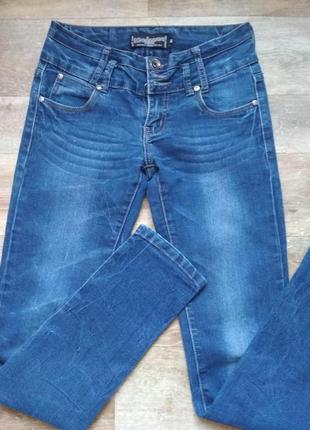 Отличные стрейчевые джинсы madonna р. xs, замеры на фото3 фото