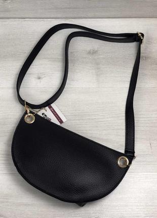 Жіноча сумка на пояс-клатч чорного кольору2 фото