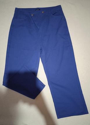 Широкі укорочені брюки з оригінальною застібкою 16 розмір