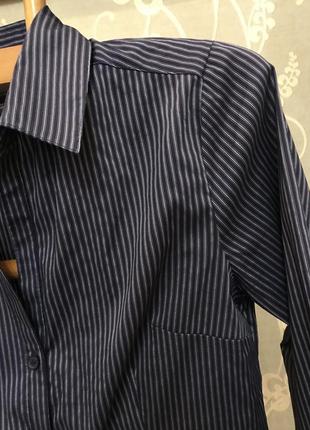 Очень красивая и стильная брендовая блузка в полоску.4 фото