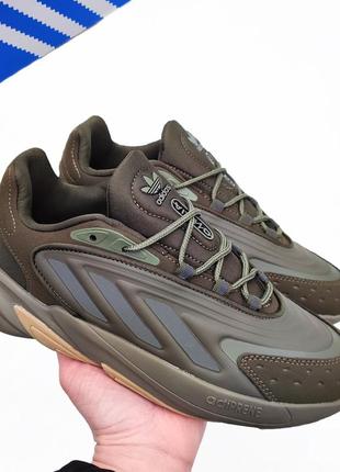 Яркие кроссовки adidas ozelia коричневые бежевые камуфляжные кроссы пена мягкие7 фото