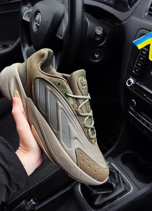 Яркие кроссовки adidas ozelia коричневые бежевые камуфляжные кроссы пена мягкие5 фото