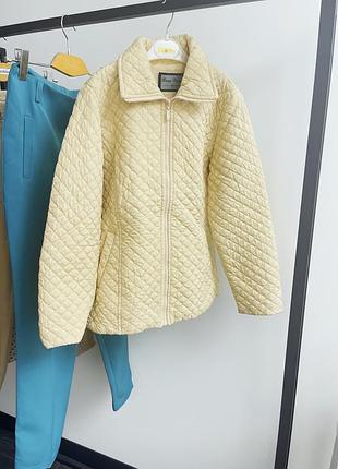 Куртка молочнева нова 2