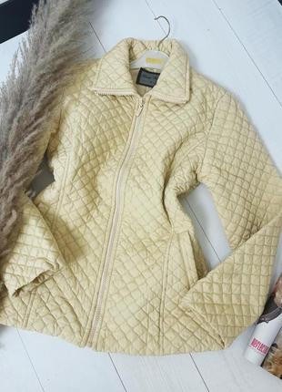 Куртка молочнева нова