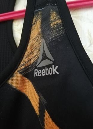 Спортивный бра жіночий топ reebok новый сток чорний коричневий у сітку не просвічує2 фото