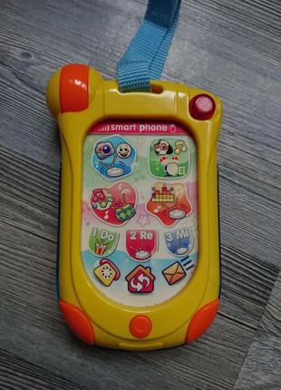 Игрушка мобильный телефон